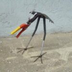 clipper head shovel bird yard art metal sculpture